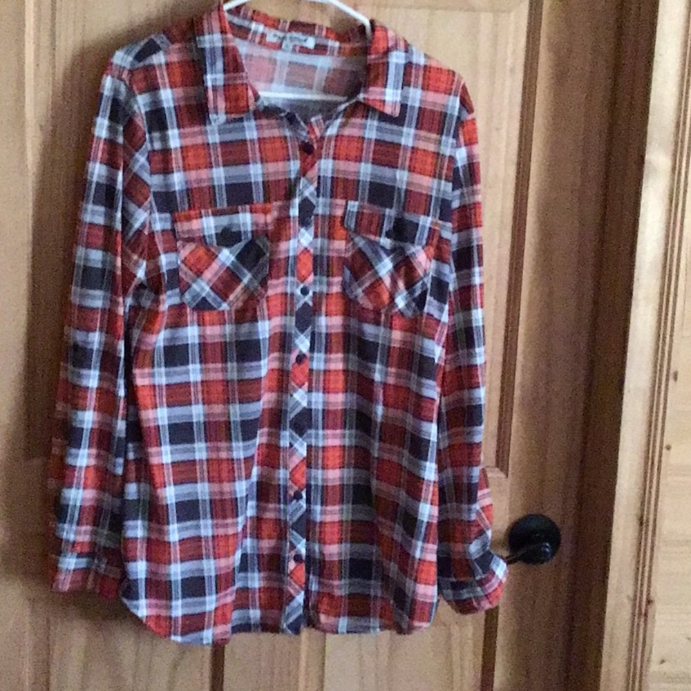 Plaid patter but it is not flannel it is T-shirt ma